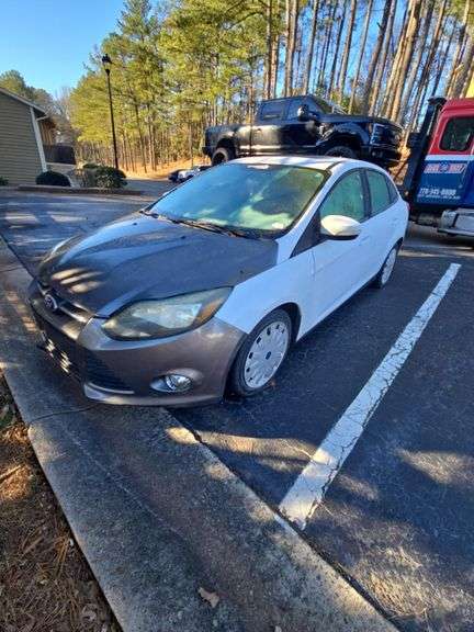 141725 2014  FORD  Focus  1FADP3F28EL312912