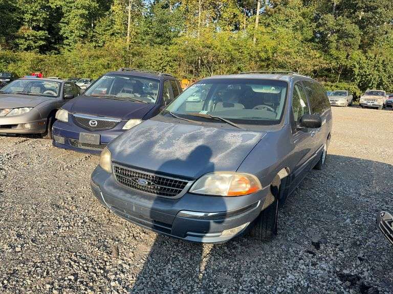 . 1999 FORD WINDSTAR 2FMDA5240XBB50318